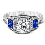 Leia Round-Cut Three-Stone Halo Engagement Ring