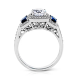 Leia Round-Cut Three-Stone Halo Engagement Ring